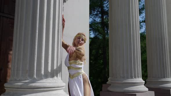 Stunning Ancient Goddess is Posing White Column Nearby Greek Goddess Aphrodite
