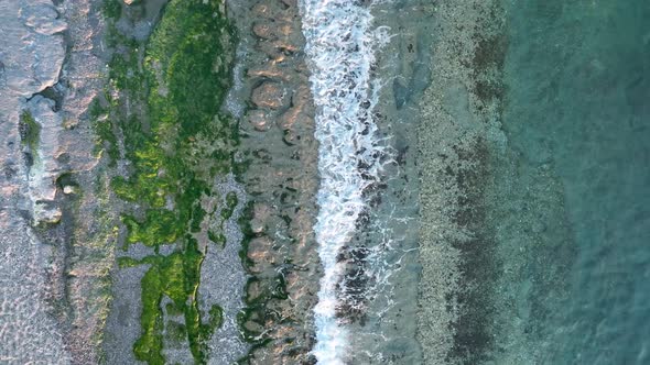 Texture of the rocky beach aerial view 4 K Turkey Alanya