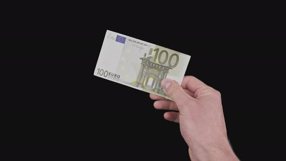 Male Hand Shows Banknote of 100 Euro with Alpha Channel