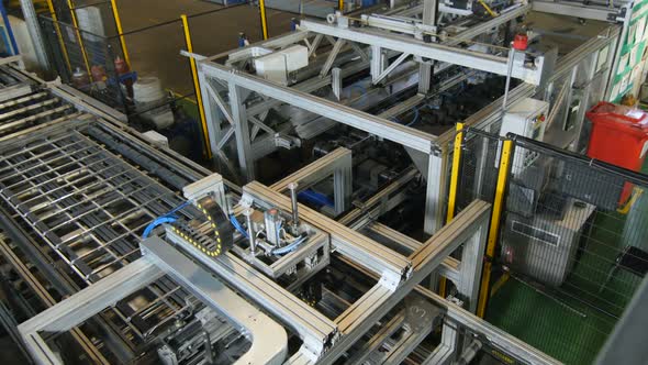 Motion Over Modern Automatic Machine Collecting Metal Frame