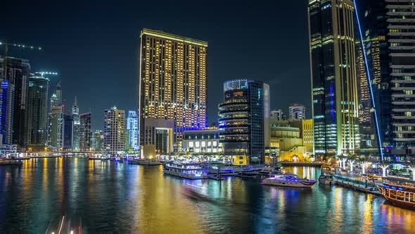 View of Dubai Marina Towers and Canal in Dubai Night Timelapse Hyperlapse