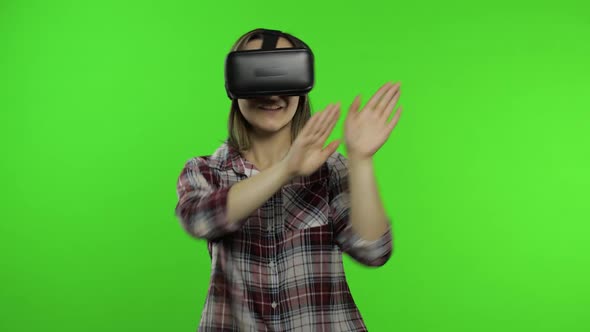 Woman Using VR Headset Helmet To Play Game, Dance. Watching Virtual Reality 3d Video. Chroma Key