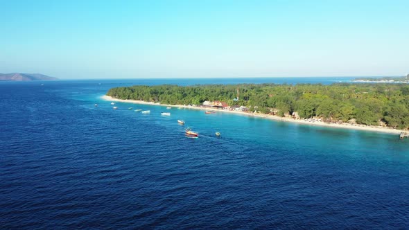 Aerial seascape of relaxing shore beach holiday by blue ocean and white sandy background of a dayout