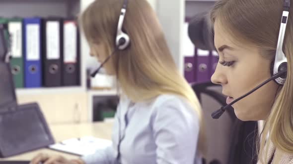 Call Center Agents Speaking with Customer