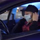 Delivery Man Putting on Medical Face Mask to - VideoHive Item for Sale