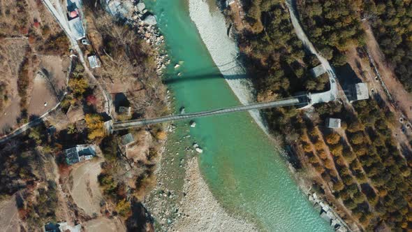 Aerial 90 Degree View of bridge over Bhagirathi river in Harshil, Uttarkashi, Uttarakhand, India