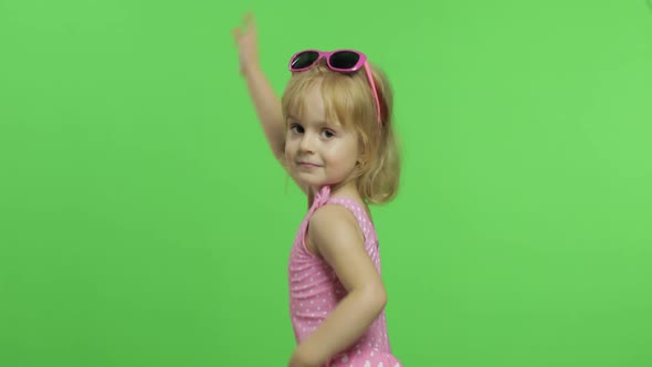Child in Pink Swimsuit Doing Sports Exercises, Girl Fitness Training and Dancing