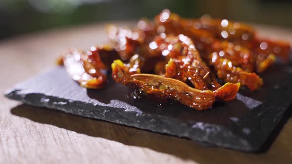 Dried Tomatoes with Olive Oil. Ingredients for Making Pizza.