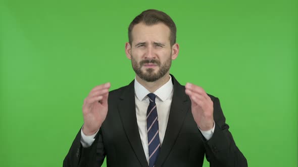 Tired Young Businessman Having Headache Against Chroma Key