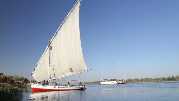 Local people with tourists on felucca