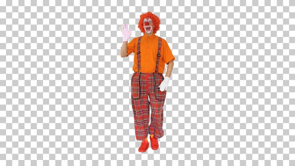 Clown in a red wig walking and greeting everyone, Alpha Channel