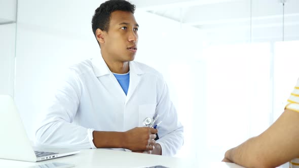 Doctor Talking with  Patient, Examining Health