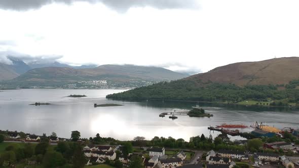 Cinematic drone shot of scottish lakeside village