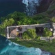 Aerial top down view going past a Temple and into ocean in Bali - VideoHive Item for Sale