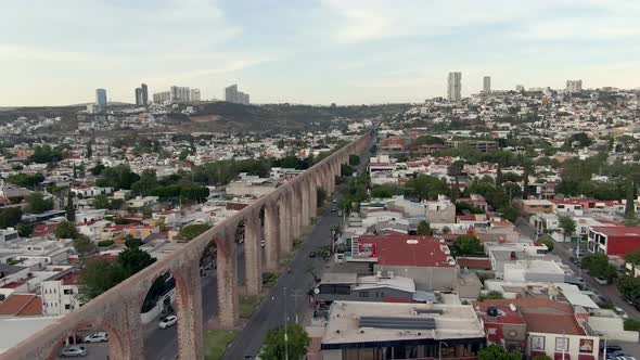 Acueducto de Queretaro - Old And Historic Queretaro Aqueduct Along The City In Mexico. - aerial