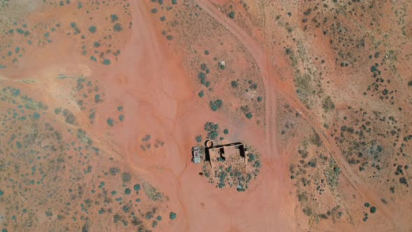 Looking down on an abandoned and wreck building in the outback