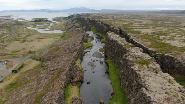 River between tectonic plates in Thingvellir National Park in Iceland