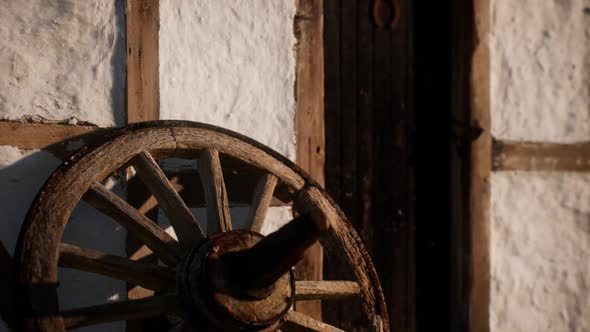 Old Wood Wheel and Black Door at White House