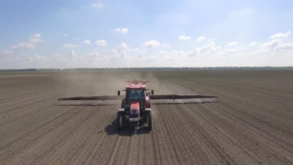 Flying In Front Of A Tractor