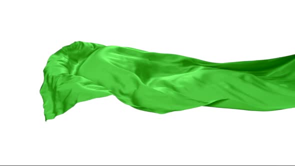 Green fabric flowing on white background, Slow Motion