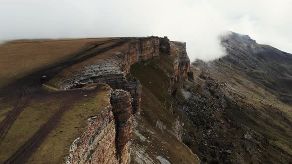Aerial View of Stone Amphitheater in Thick Clouds Bermamyt Plateau Caucasus