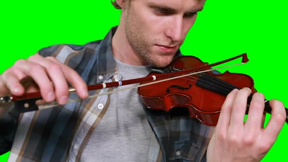 Close-up of male musician playing violin