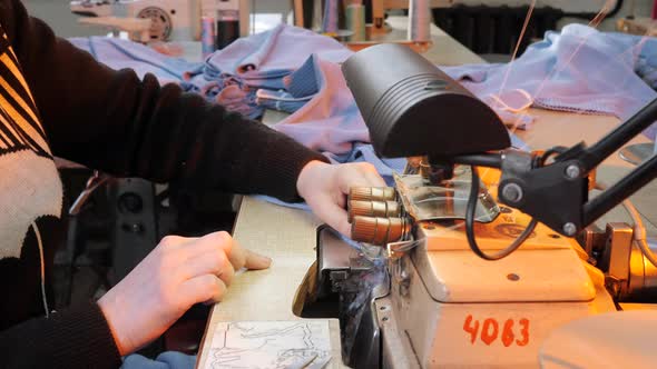 Female Hands Working on Tailoring