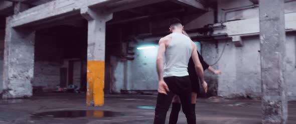 Dancers in a Parking Lot