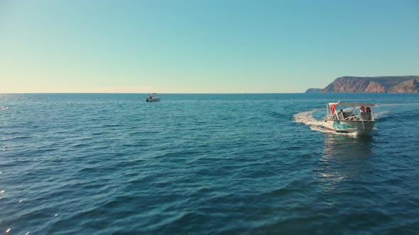 Flying Over the Sea and Boats on Sunny Day