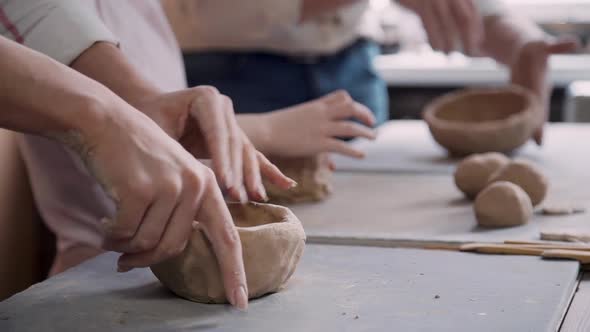 Little Kid Girl with Her Charming Family Making Ceramic Object