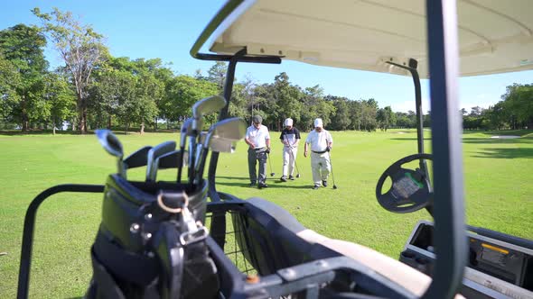 4K Asian businessman shaking hand after finish golfing and talking business project on golf course