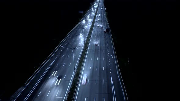 Rush Hour Traffic on a Freeway at Night. Time Lapse