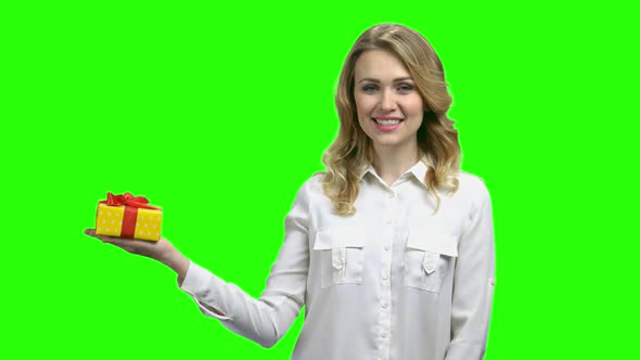 Woman Holding Gift Box on Green Screen