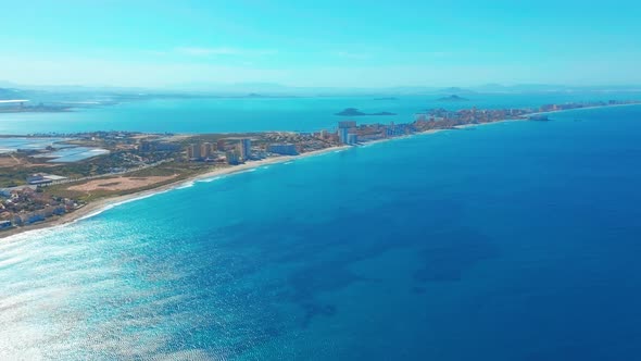 Aerial View. A Picturesque Looking View of a Long Sand Spit La-Manga, Spain