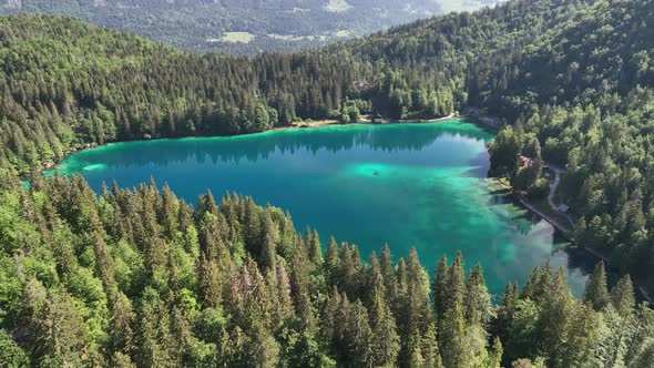 Emerald lake at Fusine with Mangart mountain