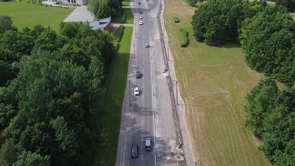 Aerial View of Road Traffic in Suburbia of Kaunas, Lithuania on Sunny Summer Day, Drone Shot