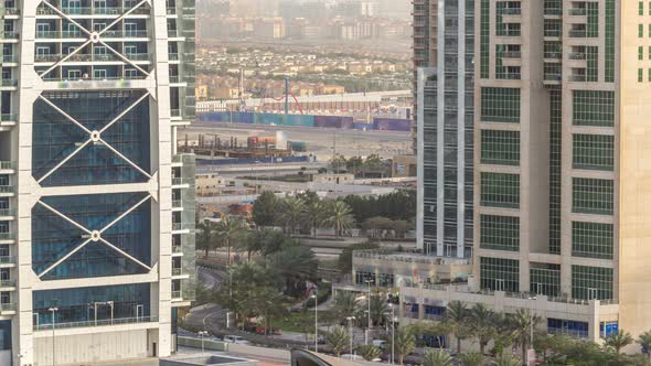 Aerial View of Jumeirah Lakes Towers Skyscrapers Timelapse with Traffic on Sheikh Zayed Road