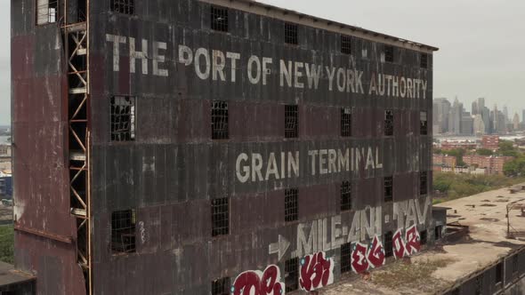 Rotating Aerial View of the Letters on the Top of Historical Empty Red Hook Grain Terminal in New