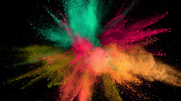 Super Slowmotion Shot of Color Powder Explosion Isolated on Black Background.