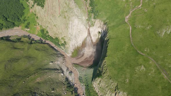 Dirty Waterfall Sultan High in the Mountains Near Elbrus in Summer