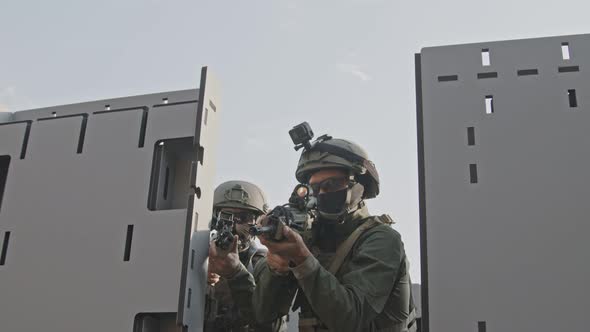 Slow motion of soldiers training in close quarters combat alt