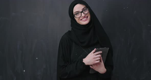 Muslim Business Woman Holding Tablet Computer Wearing Hijab Clothes