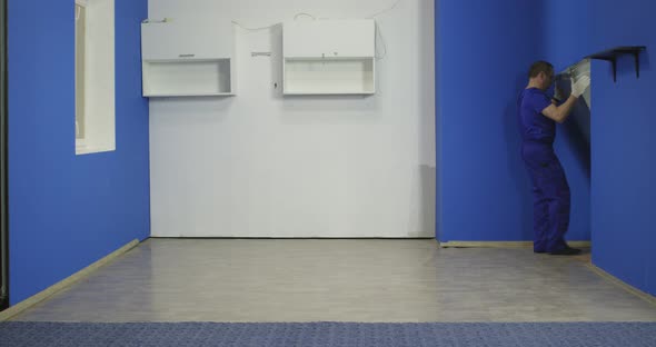 Technicians Bring the Refrigerator To the Kitchen