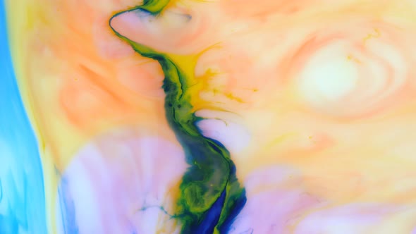 Moving Background Consisting of Blue Yellow Red and Green Particles of the Current Paint on a White