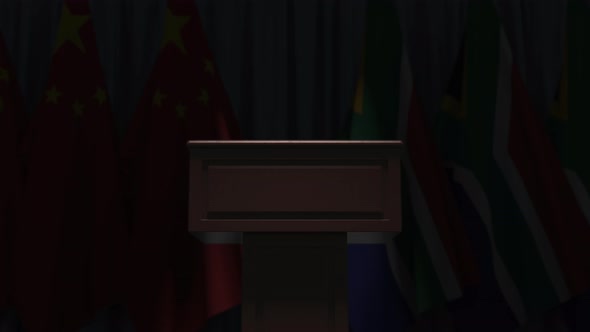 Flags of South Africa and China and and Speaker Tribune