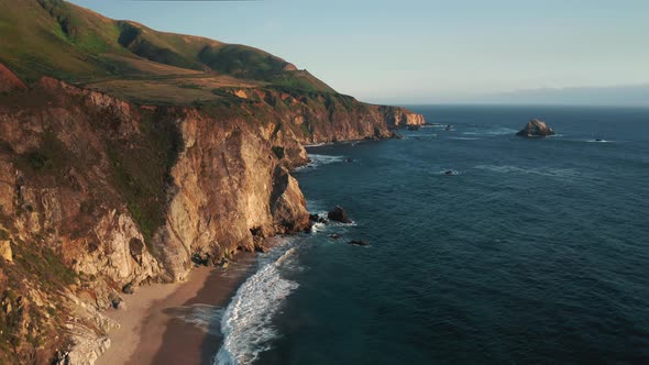 Sunset Over the Wild Beach on California Coast, Travel USA. Scenic Big Sur View