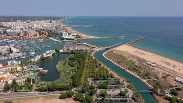 Aerial Video of the Tourist Portuguese Town of Vilamoura with Views of the Beaches and Docks for