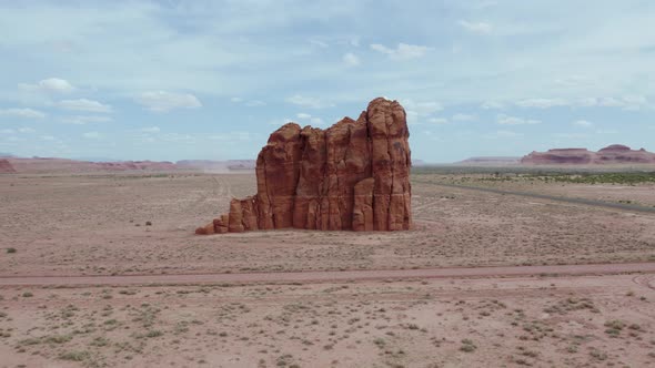 Rock Formation Standing Alone in Arid, Desolate Desert of Arizona, Aerial