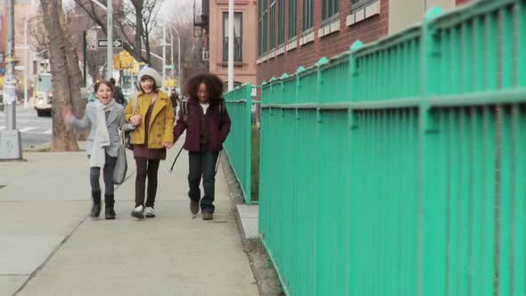 Three girls walking together