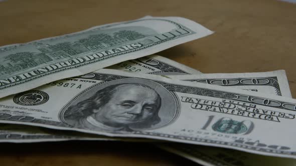 Rotating stock footage shot of $100 bills - MONEY 0155